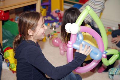 Birthday Party Girld Hold Balloon Animals Fish